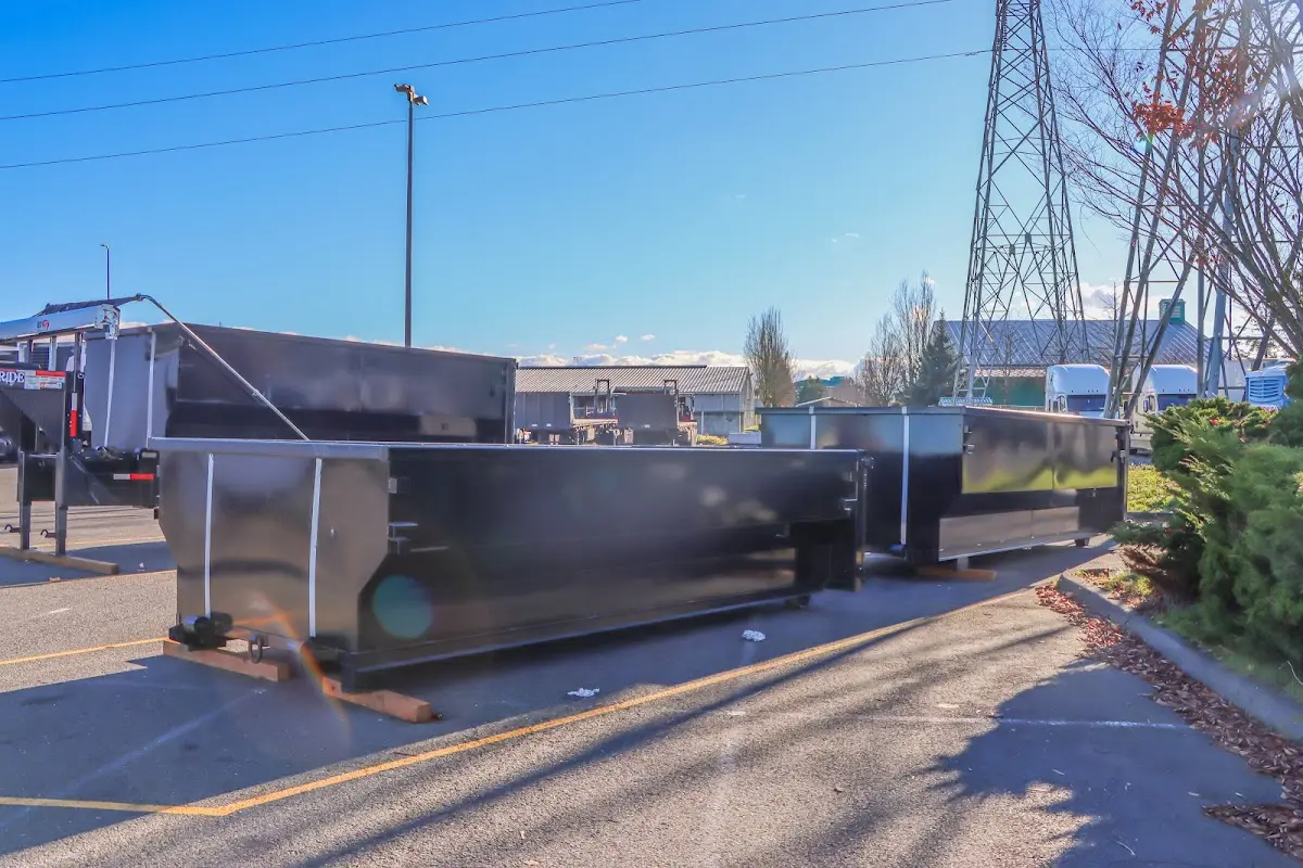 Roll-off dumpster ready for waste disposal at job site for Commercial Dumpster Rental in East Bridgewater